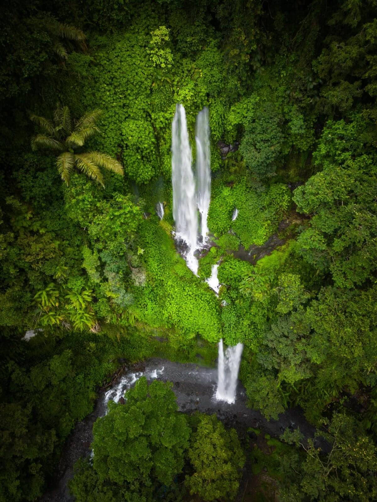Aerial view of twin waterfalls hidden in Tetebatu jungle, Lombok